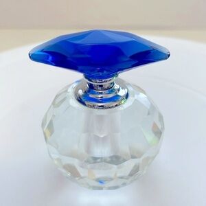 Clear Perfume Bottle with Blue Lid